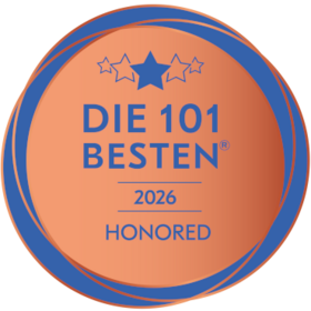 Bronzene Plakette mit der Aufschrift "DIE 101 BESTEN 2025 HONORED" und Sternenmotiv.