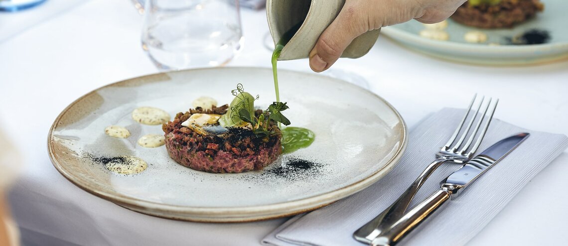 Steaktartar on the rooftop LOUIS Roof Terrace from the Grillroom restaurant in Munich