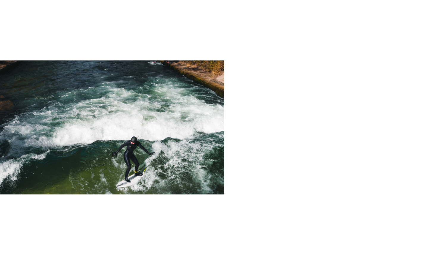 Surfer in Neoprenanzug reitet auf stehender Welle im Eisbach, München.