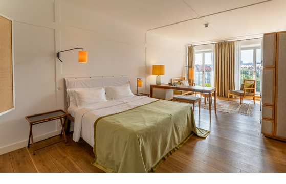 Double bed in LOUIS Hotel Munich Germany Market View Room by Viktualienmarkt