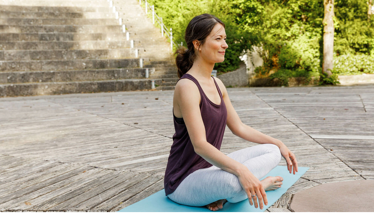 Relaxing with outdoor yoga