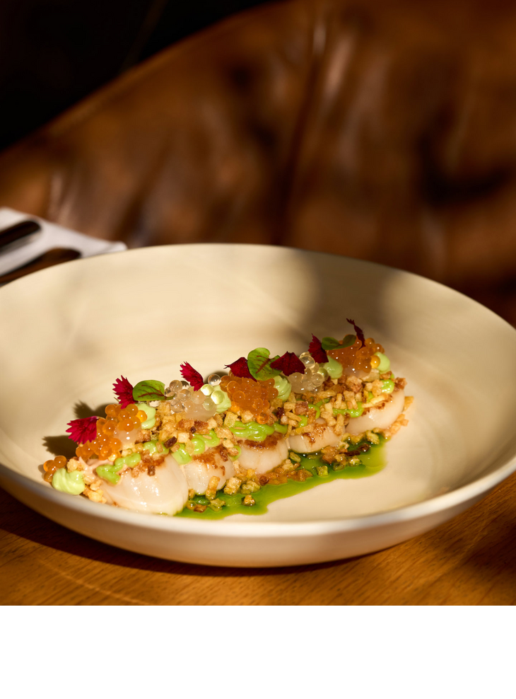 Scallops and caviar, artfully presented.